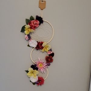 Homemade dreamcatcher with flowers